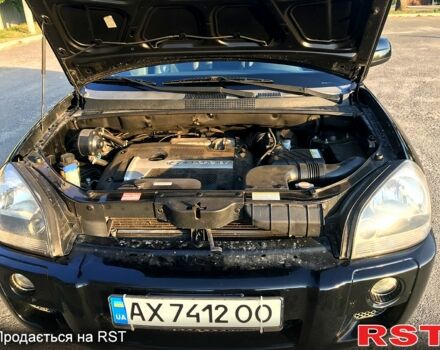 Хендай Туксон 2005 в Первомайском на Automoto.ua Черный Хендай Туксон, объемом двигателя 2 л и пробегом 253 тыс. км за 7700 $, фото 4 на Automoto.ua