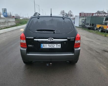 Черный Хендай Туксон, объемом двигателя 2 л и пробегом 180 тыс. км за 4500 $, фото 4 на Automoto.ua