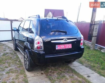 Черный Хендай Туксон, объемом двигателя 2 л и пробегом 208 тыс. км за 6950 $, фото 40 на Automoto.ua