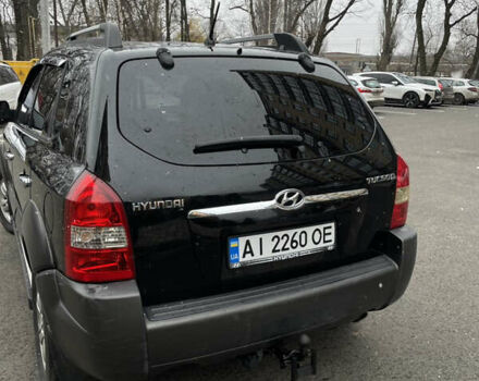 Чорний Хендай Туксон, об'ємом двигуна 1.98 л та пробігом 225 тис. км за 6600 $, фото 9 на Automoto.ua