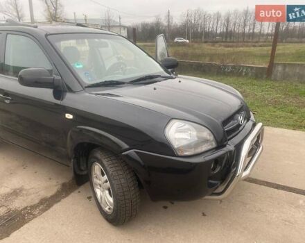 Черный Хендай Туксон, объемом двигателя 2 л и пробегом 190 тыс. км за 7500 $, фото 6 на Automoto.ua