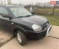 Черный Хендай Туксон, объемом двигателя 2 л и пробегом 190 тыс. км за 7500 $, фото 6 на Automoto.ua
