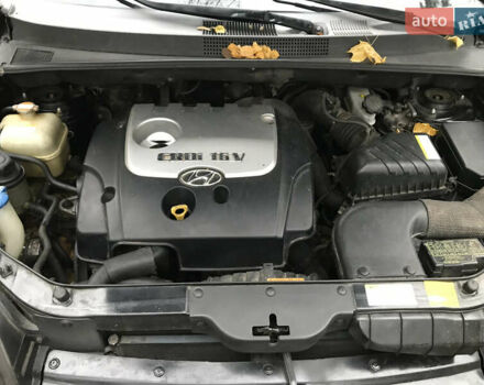 Черный Хендай Туксон, объемом двигателя 2 л и пробегом 261 тыс. км за 6500 $, фото 16 на Automoto.ua