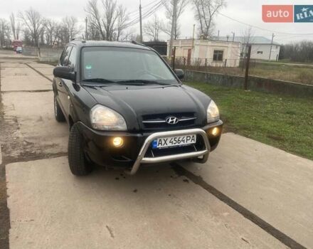Черный Хендай Туксон, объемом двигателя 2 л и пробегом 190 тыс. км за 7500 $, фото 15 на Automoto.ua