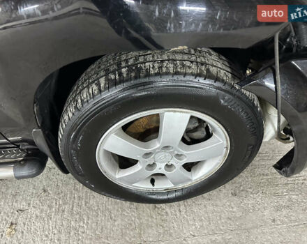 Чорний Хендай Туксон, об'ємом двигуна 2 л та пробігом 252 тис. км за 3000 $, фото 21 на Automoto.ua