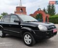 Черный Хендай Туксон, объемом двигателя 2 л и пробегом 249 тыс. км за 8300 $, фото 2 на Automoto.ua