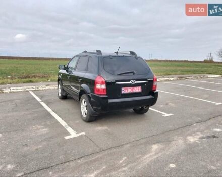 Черный Хендай Туксон, объемом двигателя 2 л и пробегом 127 тыс. км за 7590 $, фото 24 на Automoto.ua