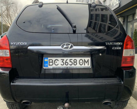 Черный Хендай Туксон, объемом двигателя 1.99 л и пробегом 290 тыс. км за 7700 $, фото 4 на Automoto.ua