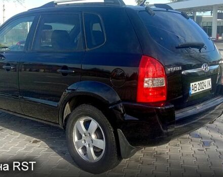 Черный Хендай Туксон, объемом двигателя 2 л и пробегом 260 тыс. км за 8000 $, фото 4 на Automoto.ua