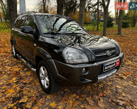 Черный Хендай Туксон, объемом двигателя 2 л и пробегом 210 тыс. км за 7990 $, фото 3 на Automoto.ua