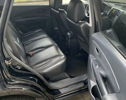 Черный Хендай Туксон, объемом двигателя 1.99 л и пробегом 290 тыс. км за 7700 $, фото 18 на Automoto.ua