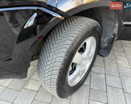Черный Хендай Туксон, объемом двигателя 2 л и пробегом 249 тыс. км за 7450 $, фото 15 на Automoto.ua