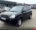 Черный Хендай Туксон, объемом двигателя 2 л и пробегом 200 тыс. км за 7800 $, фото 2 на Automoto.ua