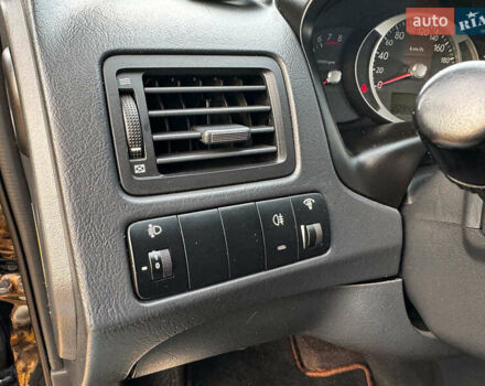 Черный Хендай Туксон, объемом двигателя 2 л и пробегом 210 тыс. км за 7990 $, фото 16 на Automoto.ua