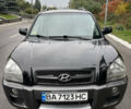 Черный Хендай Туксон, объемом двигателя 2 л и пробегом 209 тыс. км за 7800 $, фото 2 на Automoto.ua