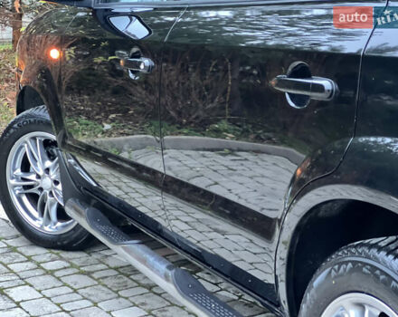 Чорний Хендай Туксон, об'ємом двигуна 1.98 л та пробігом 170 тис. км за 6999 $, фото 43 на Automoto.ua