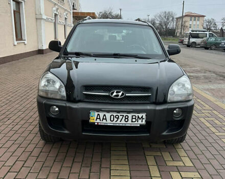 Черный Хендай Туксон, объемом двигателя 1.98 л и пробегом 227 тыс. км за 6900 $, фото 4 на Automoto.ua