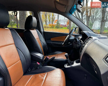 Черный Хендай Туксон, объемом двигателя 2 л и пробегом 210 тыс. км за 7990 $, фото 31 на Automoto.ua