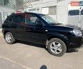 Чорний Хендай Туксон, об'ємом двигуна 2 л та пробігом 230 тис. км за 7300 $, фото 7 на Automoto.ua