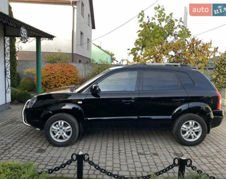 Чорний Хендай Туксон, об'ємом двигуна 1.98 л та пробігом 233 тис. км за 7650 $, фото 6 на Automoto.ua