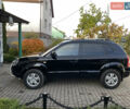 Чорний Хендай Туксон, об'ємом двигуна 1.98 л та пробігом 233 тис. км за 7650 $, фото 6 на Automoto.ua