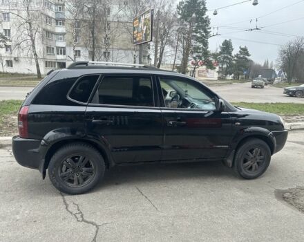 Черный Хендай Туксон, объемом двигателя 2 л и пробегом 174 тыс. км за 8000 $, фото 3 на Automoto.ua