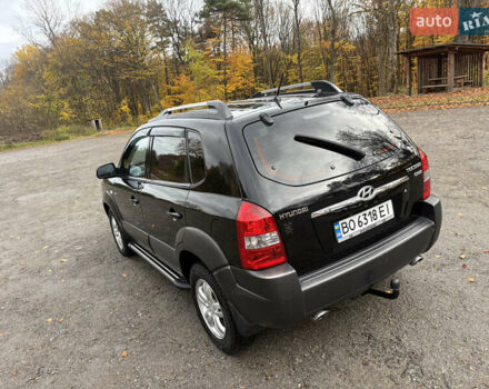 Хендай Туксон 2006 у Тернополі на Automoto.ua Чорний Хендай Туксон, об'ємом двигуна 1.99 л та пробігом 240 тис. км за 7600 $, фото 19 на Automoto.ua