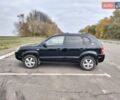 Черный Хендай Туксон, объемом двигателя 2 л и пробегом 127 тыс. км за 7590 $, фото 25 на Automoto.ua