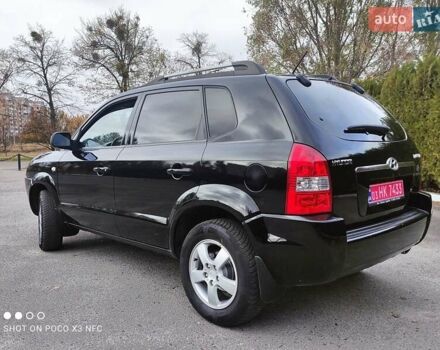 Черный Хендай Туксон, объемом двигателя 2 л и пробегом 237 тыс. км за 7999 $, фото 13 на Automoto.ua