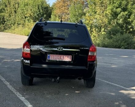 Черный Хендай Туксон, объемом двигателя 2 л и пробегом 266 тыс. км за 7700 $, фото 3 на Automoto.ua