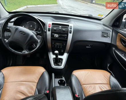 Черный Хендай Туксон, объемом двигателя 2 л и пробегом 209 тыс. км за 7800 $, фото 18 на Automoto.ua