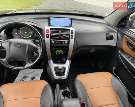 Черный Хендай Туксон, объемом двигателя 2 л и пробегом 216 тыс. км за 7500 $, фото 38 на Automoto.ua