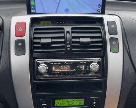 Черный Хендай Туксон, объемом двигателя 2 л и пробегом 216 тыс. км за 7500 $, фото 41 на Automoto.ua