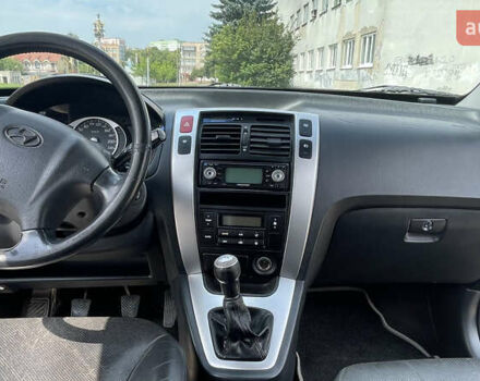 Черный Хендай Туксон, объемом двигателя 2 л и пробегом 236 тыс. км за 6950 $, фото 11 на Automoto.ua