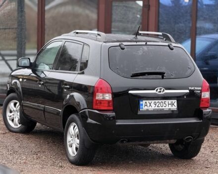 Черный Хендай Туксон, объемом двигателя 2 л и пробегом 263 тыс. км за 7950 $, фото 6 на Automoto.ua