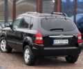 Черный Хендай Туксон, объемом двигателя 2 л и пробегом 263 тыс. км за 7950 $, фото 6 на Automoto.ua