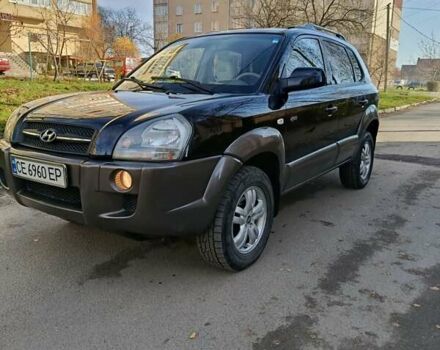 Черный Хендай Туксон, объемом двигателя 1.98 л и пробегом 256 тыс. км за 8000 $, фото 14 на Automoto.ua