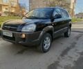 Черный Хендай Туксон, объемом двигателя 1.98 л и пробегом 256 тыс. км за 8000 $, фото 14 на Automoto.ua