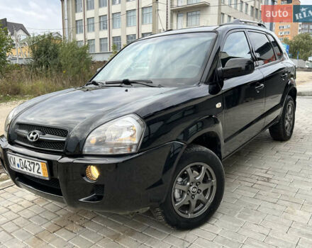 Чорний Хендай Туксон, об'ємом двигуна 2 л та пробігом 144 тис. км за 6599 $, фото 2 на Automoto.ua