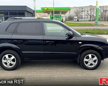 Черный Хендай Туксон, объемом двигателя 2 л и пробегом 200 тыс. км за 7800 $, фото 7 на Automoto.ua
