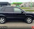 Черный Хендай Туксон, объемом двигателя 2 л и пробегом 200 тыс. км за 7800 $, фото 7 на Automoto.ua