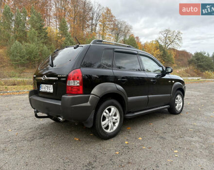 Хендай Туксон 2006 у Тернополі на Automoto.ua Чорний Хендай Туксон, об'ємом двигуна 1.99 л та пробігом 240 тис. км за 7600 $, фото 11 на Automoto.ua