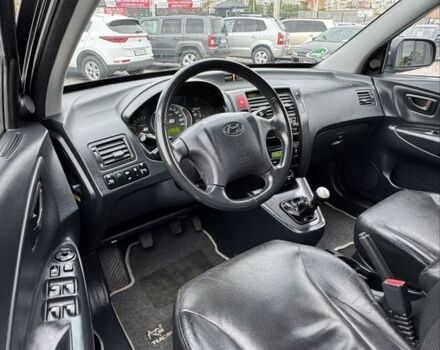 Черный Хендай Туксон, объемом двигателя 2 л и пробегом 163 тыс. км за 8400 $, фото 9 на Automoto.ua
