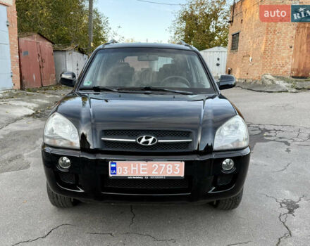 Черный Хендай Туксон, объемом двигателя 2 л и пробегом 189 тыс. км за 7150 $, фото 11 на Automoto.ua