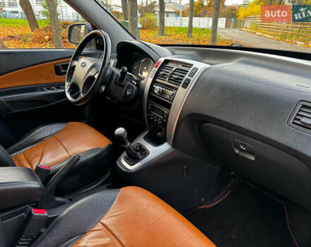 Черный Хендай Туксон, объемом двигателя 2 л и пробегом 210 тыс. км за 7990 $, фото 29 на Automoto.ua