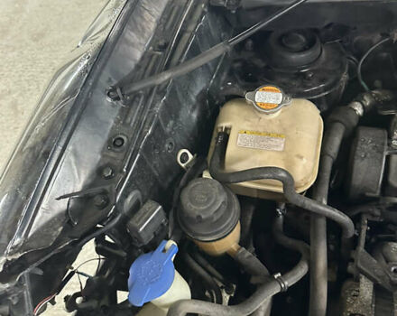 Чорний Хендай Туксон, об'ємом двигуна 2 л та пробігом 252 тис. км за 3000 $, фото 26 на Automoto.ua