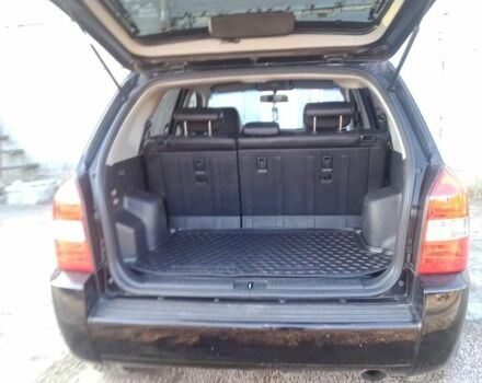 Черный Хендай Туксон, объемом двигателя 2 л и пробегом 203 тыс. км за 7500 $, фото 4 на Automoto.ua