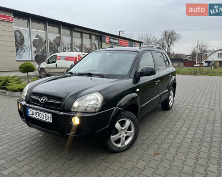Черный Хендай Туксон, объемом двигателя 2 л и пробегом 242 тыс. км за 6999 $, фото 12 на Automoto.ua