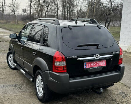 Черный Хендай Туксон, объемом двигателя 2 л и пробегом 201 тыс. км за 7750 $, фото 9 на Automoto.ua