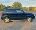 Чорний Хендай Туксон, об'ємом двигуна 2 л та пробігом 228 тис. км за 7800 $, фото 2 на Automoto.ua